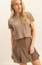 Load image into Gallery viewer, Woman wearing a brown textured top and skirt on a plain background

